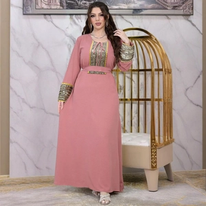 Elegant mauve jalabiya gown with golden sequin embroidery and decorative waist belt