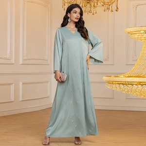 Elegant sage green satin evening gown with silver beaded vine embroidery and flared sleeves