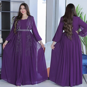 Deep purple chiffon evening gown with silver beaded bodice and flowing maxi skirt