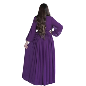 Detail showing the pleated back of a deep purple maxi dress with tie-up belt waist