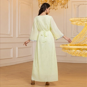 Light yellow chiffon dress with silver bow prints and elegant flared sleeves back view