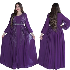 Detail of purple evening gown with silver rhinestones and elegant beaded waist belt