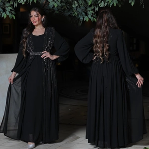 Elegant black long evening gown with silver sequins and matching belt in abaya style
