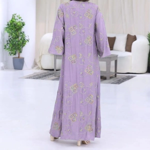 Detailed back view of light purple kaftan featuring ethnic geometric embroidery