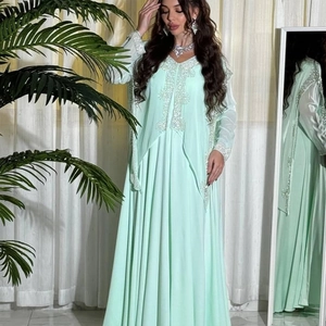 Elegant mint green chiffon maxi kaftan dress with intricate silver embroidery details