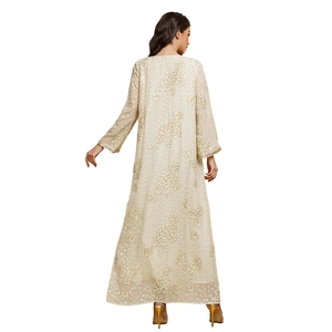 Back view of elegant champagne embroidered long robe with floral pattern and textured fabric