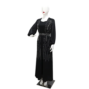 Detailed view of black Abaya robe with sparkling silver rhinestones and waist belt