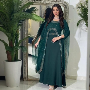 Elegant dark green fitted evening gown with sequins and matching sheer tulle shawl