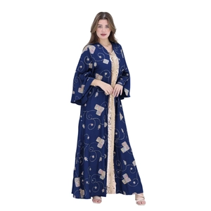 Detail of navy blue abaya with golden sequins trim and colorful geometric embroidery