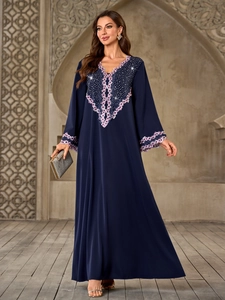 Elegant navy blue V-neck abaya dress with rhinestone accents and floral lace trim