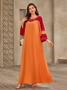 Robe longue caftan patchwork orange et rouge avec strass et manches évasées fluides