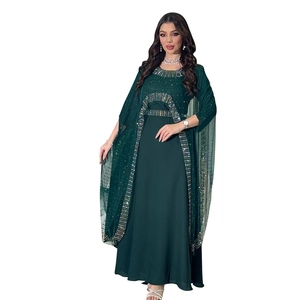 Detail of dark green Abaya gown with exquisite silver beadwork on collar and cuffs