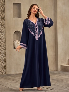 Elegant navy blue V-neck kaftan maxi dress with floral embroidery and rhinestones