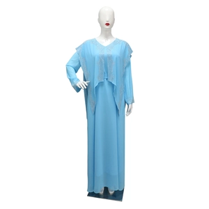 Detail of light blue chiffon Abaya featuring intricate silver rhinestone floral patterns