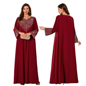 Detail of burgundy V-neck abaya dress with sparkling rhinestone patterns and long sleeves