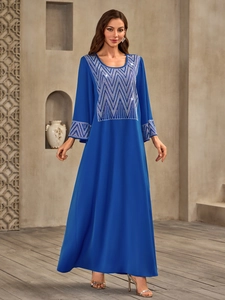 Elegant blue Muslim maxi dress with long sleeves and silver geometric pattern
