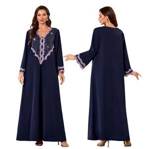 Front and back view of navy V-neck maxi dress with pink floral embroidery detail