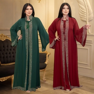 Detail of beaded necklines and sequined sleeves on luxurious chiffon party abaya set