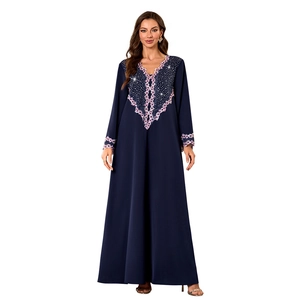 Detail of V-neck lace embroidery and rhinestones on long sleeve navy maxi dress