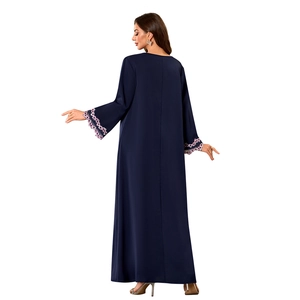 Rear view of navy blue V-neck loose kaftan abaya featuring floral lace embroidery details