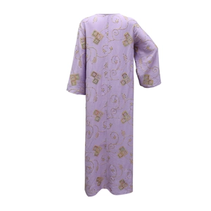 Detailed close-up of lavender kaftan with ethnic embroidery and shimmering sequins decor