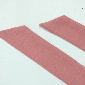 Detail of dark pink fabric straps with fine horizontal texture for Jalabiya evening dress