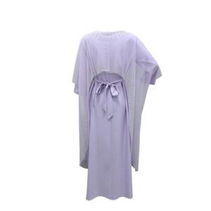 Detail of lavender evening gown featuring rhinestone cape and back ribbon bow