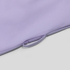 Detailed close-up of the light purple rhinestone evening dress fabric and matching handle