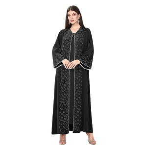 Detailed silver bead embroidery and sequins on the black Abaya dress sleeves and front