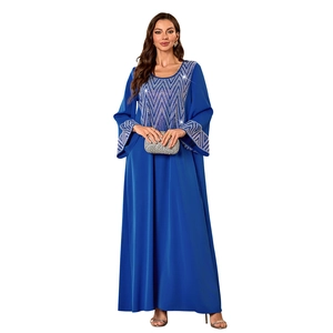 Detail of royal blue Muslim abaya featuring silver heat-fixed rhinestones on collar and cuffs