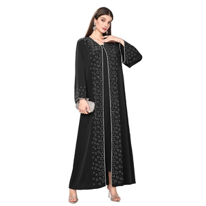 Detail of elegant black Abaya dress featuring sparkling silver rhinestone embroidery on cuffs