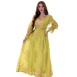 Elegant lime green long sleeve maxi dress featuring intricate gold floral embroidery