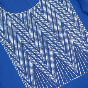 Detailed view of geometric rhinestone patterns on a royal blue Muslim maxi dress