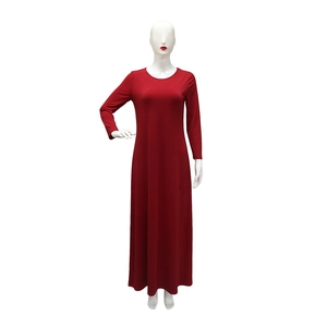 Detailed view of the dark red long sleeve maxi dress featuring a modest crew neckline