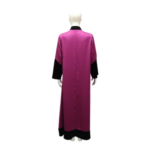 Back view of magenta satin abaya featuring black contrast patchwork and elegant long silhouette
