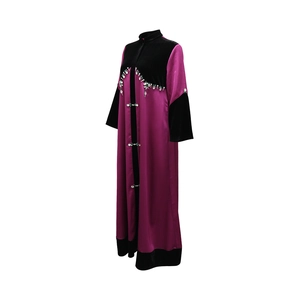 Detail of the beaded collar and velvet stitching on this burgundy women abaya robe