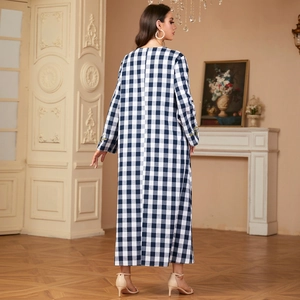 Blue gingham long dress with yellow floral embroidery on sleeves shown from back