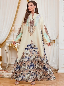 Exquisite floral embroidery and pattern details on luxury beige satin kaftan robe dress
