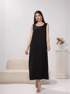 Elegant black satin sleeveless maxi dress with minimalist H-line cut and silky finish