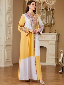 Elegant long kaftan dress with yellow contrast panels and vibrant ethnic embroidery