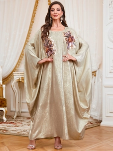 Elegant champagne gold kaftan with batwing sleeves and 3D floral sequin embroidery