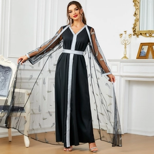Elegant two-piece black kaftan dress featuring silver embroidery and a high-waist belt