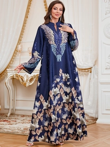 Deep blue long-sleeved floral maxi dress with pearl embroidery and bohemian accents