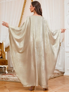 Elegant champagne gold kaftan dress with batwing sleeves and metallic shimmer fabric