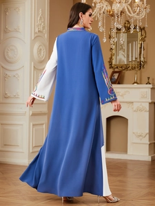 Elegant color block abaya with ethnic embroidery and loose fit silhouette for women