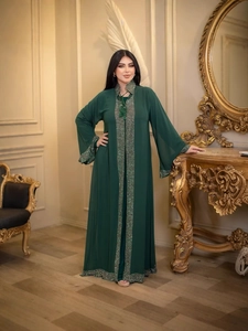 Elegant deep green abaya evening dress with luxury sequin embroidery and tassel detail