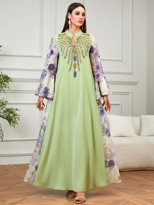 Elegant mint green Abaya dress with beaded V-neck, floral flared sleeves and kaftan silhouette