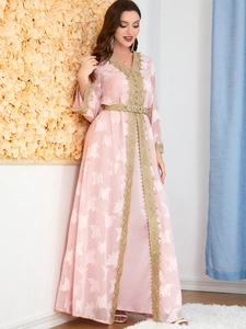 Detail of pink V-neck maxi dress with gold floral embroidery and decorative waist belt