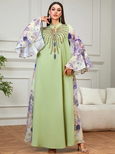 Elegant mint green abaya maxi dress with floral bell sleeves and beaded V-neckline