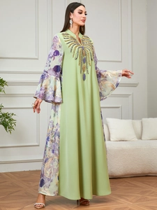 Elegant sage green Abaya maxi dress with floral bell sleeves and beaded V-neck embroidery